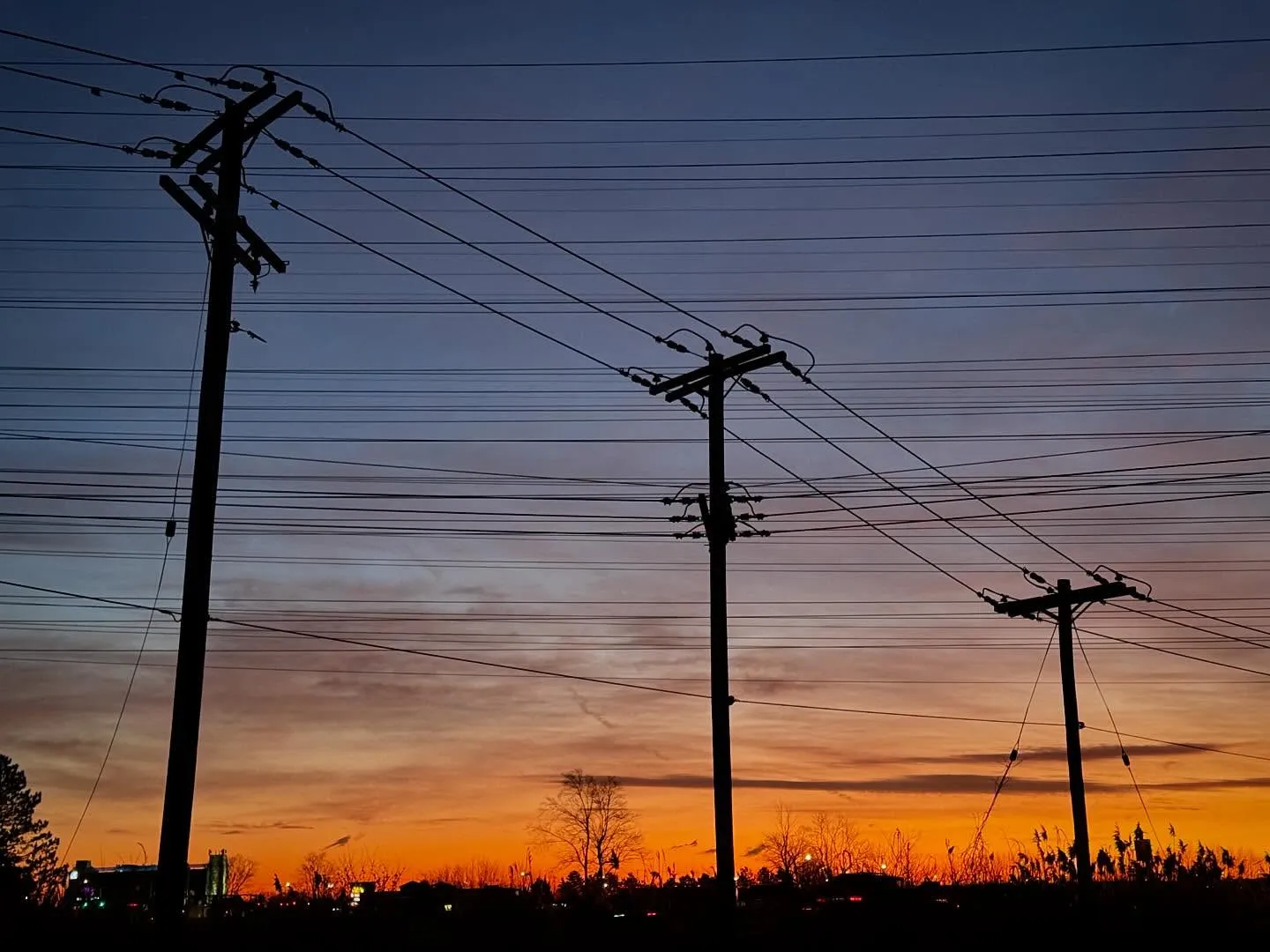 Power lines at dusk